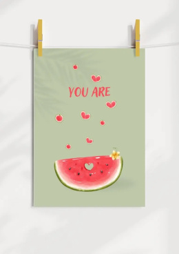 Plakat przedstawia ukrojonego arbuza z małymi serduszkami nad nim oraz napisem You are
